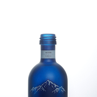 Grosir bentuk kustom bulat kecil Mini 50ml minuman alkohol Vodka wiski Rum botol kaca dengan tutup tutup aluminium
