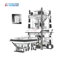 Machine de soufflage de film co-extrudé automatique à trois couches pour emballages robustes et alimentaires, avec enroulement à interstice central et rendement élevé