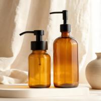 Bouteilles distributrices rondes en verre ambré de 8 oz et 16 oz avec pompe pulvérisateur et système de fermeture pour savon liquide, shampoing et lotion corporelle