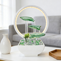 Fontaine d'eau d'intérieur en verre vert avec feuilles, fontaine de table avec lumière LED pour la décoration de la maison ou du bureau