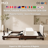 Reformer de Pilates pliable en noyer américain de luxe pour studio professionnel, lit de Pilates en bois haute performance avec ressorts réglables