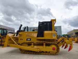 รถดันดิน CAT D7G มือสอง ประหยัดน้ำมัน เครื่องยนต์เสถียร แรงสูง คุณภาพดี ใบมีดทนทาน พร้อมริปเปอร์หลัง มีสินค้าในสต็อก - Product Image 1