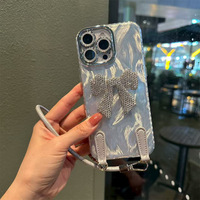 Coque de téléphone portable avec nœud papillon en argent pour iPhone 17 Pro Max Design de luxe Couverture iPhone pour femme pour 16 15 14 Résistant aux chutes