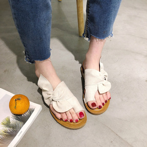 Playa de mujer americana y europea para zapatillas cómodas y suaves con luz plana con lazo al por mayor para uso en interiores y exteriores - Product Image 1