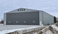 Hangar d'avion préfabriqué en structure d'acier à grande portée avec porte de hangar personnalisée
