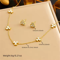 Ensemble de bijoux collier et boucles d'oreilles tendance XIXI ensemble de bijoux en acier inoxydable plaqué or 18 carats avec fleur pour cadeaux