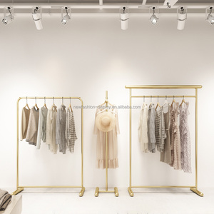 Bán buôn thép không gỉ Sàn Treo VảI hiển thị đứng phụ nữ quần áo kệ trưng bày bán lẻ Boutique vàng quần áo giá - Product Image 3