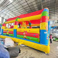 Château gonflable Thuy Linh en forme d'éléphant bleu, 5m x 10m, en PVC, facile à installer, pour applications de jeux et parcs d'attractions, garantie 12 mois