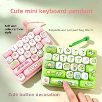 Clavier mécanique de décompression à 26 touches, jouet sensoriel à presser en forme d'animal, pendentif portable pour enfants de 5 à 7 ans