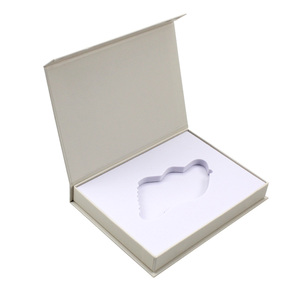 Boîte d'emballage rigide en carton recyclable en forme de livre magnétique avec logo personnalisé, dorure à chaud et gaufrage pour l'emballage de produits de beauté - Product Image 1