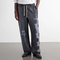 Pantalon de survêtement ample et large pour homme, avec bords effilochés, imprimé par pulvérisation, taille à cordon, style vintage délavé, streetwear, effet usé