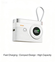 Batterie externe 10000 mAh au design rétro avec câbles de charge rapide doubles intégrés 22,5 W PD20W et écran LED pour les voyages