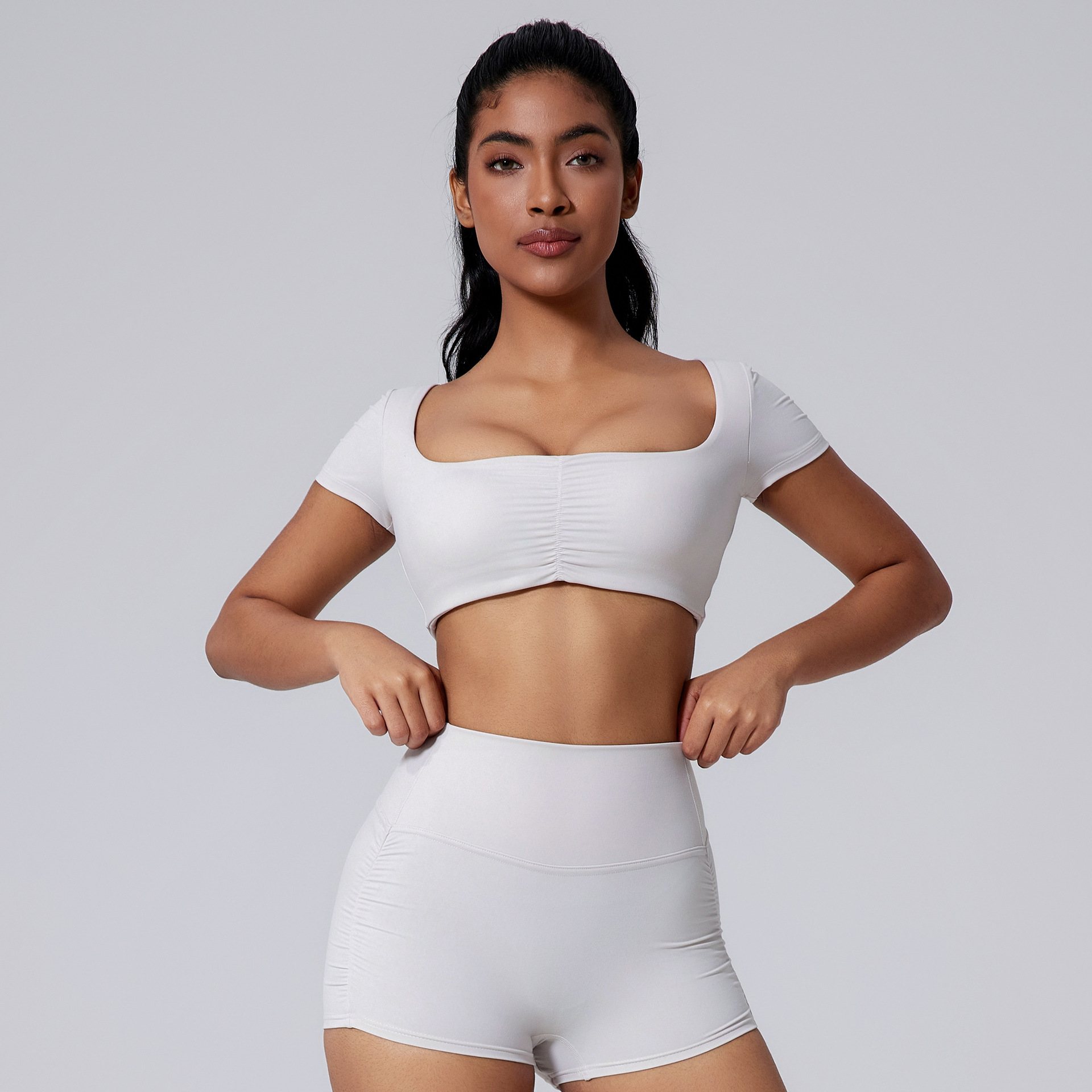 Plus-Size Activewear Top: fabric, pocket and construction detail