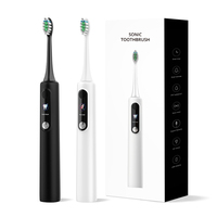 Cepillo de Dientes Sónico Eléctrico Recargable, Resistente al Agua IPX7, Cerdas Medianas, Carga Magnética, Cuerpo de Plástico, Blanco y Negro, para Adultos