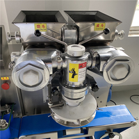 Machine de remplissage et de farce entièrement automatique d'équipement de cuisson intelligent et stable Machine à gâteau de lune à haute capacité économique
