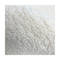 Sortie personnalisée 100% polyester tricoté tissu doux fausse fourrure pour vêtements matelas rembourrage Sherpa polaire manteau motif Design