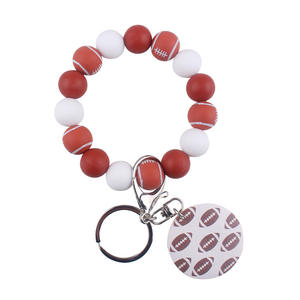 พวงกุญแจ<span class=keywords><strong>ลูก</strong></span>ปัดซิลิโคนลายพิมพ์สไตล์สปอร์ตพวงกุญแจลูกบอลห้อยจี้ทำจากไม้ชิปสำหรับแม่สอนของขวัญ - Product Image 4