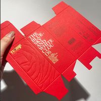 Boîte en carton de luxe personnalisée pour l'emballage de cosmétiques avec logo gaufré à l'or, pelliculage brillant et carton recyclable
