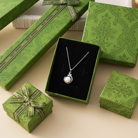 Nouveau design boîte à bijoux en carton émaillé sac à main vert foncé style rétro collier bague boucles d'oreilles bracelet boîte d'emballage pour bijoux