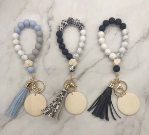 พวงกุญแจห้อยพู่ทำจากไม้เปล่าลายโมโนแกรมลูกปัดซิลิกอน - Product Image 3