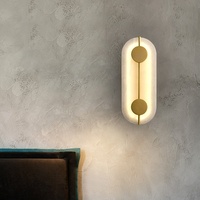 Applique murale LED moderne de luxe en cuivre avec design créatif en marbre pour le salon, la chambre à coucher et l'éclairage de l'allée de l'hôtel