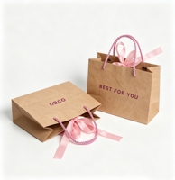 Sac de shopping en papier de luxe recyclable imprimé sur mesure à bas prix avec poignée en ruban et votre propre logo