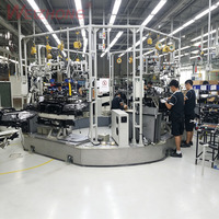 Table tournante industrielle sur mesure à profil bas intégrée pour poste de travail d'assemblage