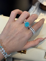 Bague de fiançailles en or 18 carats avec diamant de laboratoire bleu Paraiba taille ovale de luxe et bande pavée torsadée pour femme
