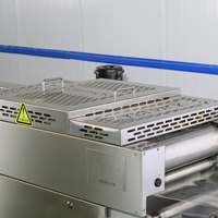 Volledig automatische machine voor het thermoformen en vacuümverpakken van dadels