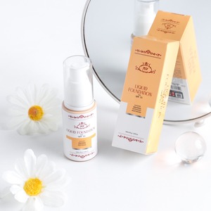 สัมผัสประสบการณ์การปกปิดด้วย 701 ลิควิด ฟาวเดชั่น สีน้ำตาลอ่อน พร้อมสารป้องกันแสงแดด SPF ขนาด 35 กรัม - Product Image 2