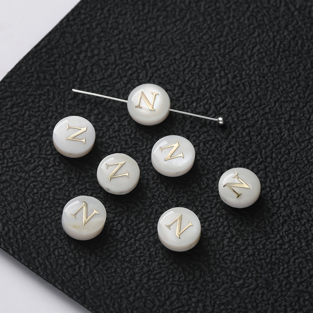 Perles lettres coquillages -- N