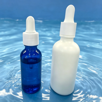 Luxuriöse 1OZ 2OZ 30ml 60ml Runde Ätherische Öl Tropfflaschen Individuelle Farbe Blau Weiß Mattiert und mit Logodruck Glasflaschen