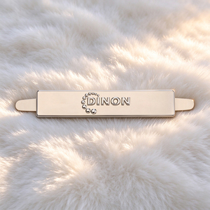 Luxury Custom Metal <b>Clothes</b> Logo Plate, Gold Plated Letters Sewable Metal Label <b>Tag</b> with Double Holes for Swimwear - Product Image 1
