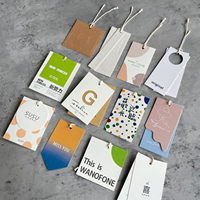 Étiquettes de vêtements de haute qualité, meilleur prix, impression personnalisée du logo, étiquettes de suspension en papier de haute qualité avec cordon en corde pour les vêtements