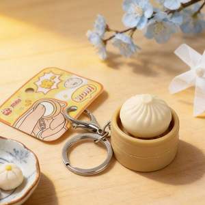 Jouet anti-stress simulé en forme de boulette vapeur, pendentif porte-clés souple en plastique à bouton-poussoir – Idéal pour la décompression et la purification des tensions ; Usine - Product Image 2