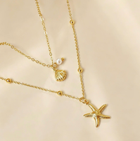 Colliers à pendentifs multicouches style océan avec étoiles de mer, coquillages et perles pour femmes, bijoux d'été à superposer pour la plage