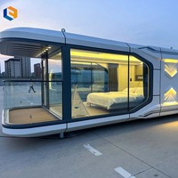 Villa modulaire extensible en forme de capsule spatiale avec mur en verre pour stations de montagne, hôtels en bord de mer et vie en plein air écologique