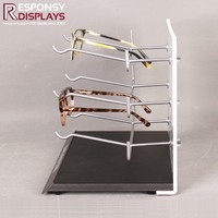 Support d'affichage moderne pour lunettes en acrylique avec panneau publicitaire et crochets suspendus pour six paires de lunettes sur le comptoir