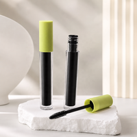 Mascara liquide noir 6,5 ml, cylindre transparent, bouchons verts mats, brosse à fibres spirales, approvisionnement en gros, logo personnalisé, maquillage cosmétique