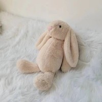 Vente en gros de cosses couleur bonbon en peluche adorable lapin de Pâques en coton PP délicat et mignon pour jeune fille