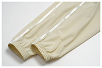 Veste Cnshell courte sans poches, entièrement zippée, coupe oversize, manches longues lanternes larges, col montant, élastique, séchage rapide