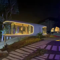Maison cabine préfabriquée de la taille d'un appartement à la mode moderne Maisons préfabriquées de 2 chambres à coucher Maison conteneur à capsules avec système intelligent