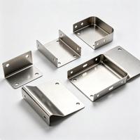 Produits de quincaillerie sur mesure, fabrication par emboutissage, matériaux de construction métalliques et autres pièces