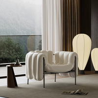 Fauteuil individuel gonflé de luxe, cadre en acier inoxydable, revêtement en tissu, fauteuil de salon pour la maison