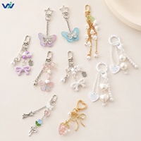 Nouveau Pendentif promotionnel en acrylique en forme de nœud, direct usine, pour sacs à main et étuis d'écouteurs, vente en gros, breloques de porte-clés DIY