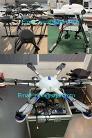 Système de drone matriciel 350 RTK avec câble rétractable automatique pour le nettoyage de fenêtres et le lavage des façades de bâtiments