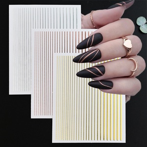Autocollants d'ongles rayés de couleur unie pour filles, 12 couleurs, lignes laser, auto-adhésifs, NKZ111, vente chaude transfrontalière - Product Image 1