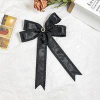 Accessoires pour femmes Pinces à cheveux avec nœud papillon et breloque en forme de cœur