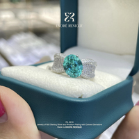 Anello in Argento Sterling 925 Placcato Rodio con Gemma Ovale da 3 carati di Paraiba Sintetica a Banda Larga per Donna