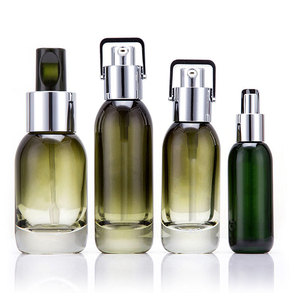 Emballage de soin de la peau de luxe personnalisé vert 30ml 40ml bouteille d'huile de sérum en verre bouteille transparente de lotion pour le corps avec pompe argentée pour les soins de la peau - Product Image 1